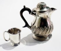 Late Victorian silver hot water jug of baluster form to stepped base, semi-wrythen, missing finial