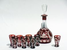 Ruby flashed glass liqueur set viz:- decanter, mallet shaped and set eight liqueur glasses