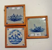 Three Dutch delft tiles, one decorated with figures, the others with buildings