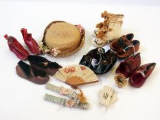 A quantity of doll's leather and silk shoes and boots, straw hat, pair of knitted gloves, garters,