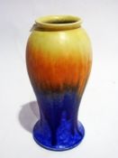 Ruskin pottery vase, inverse baluster shaped with yellow, orange and blue variegated glaze, 23cm