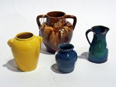 Abbotsford yellow glazed pottery vase with pair mask handles, Dunmore blue pottery vase, turquoise