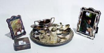 A silver cigarette box and a quantity of silver plate including photograph frames, flatware, sugar