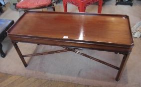 20th century mahogany rectangular topped coffee table, on straight supports united by stretchers,
