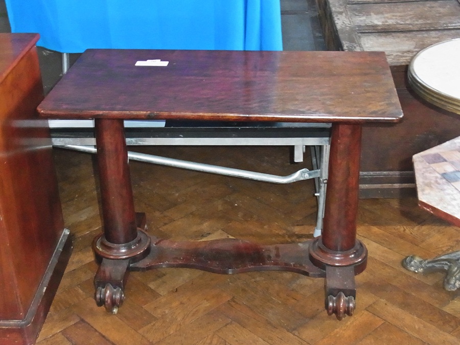 Victorian mahogany side table, the rectangular top on pair turned tapered columns, sledge and scroll