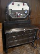 Twentieth century Jacobean style stained oak mirror back dressing chest with octagonal bevelled