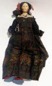 A Victorian painted composition shoulderhead doll with soft kid leather and fabric body, in lace