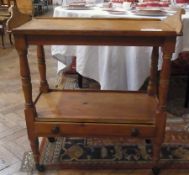 Victorian pine tray-top trolley, the lower tier with drawer, on turned supports and castors, 81cm