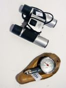 A pair of small modern binoculars, 12x25 together with a Motometer pressure gauge in leather case (