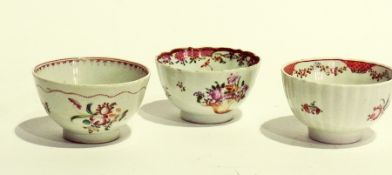 Three Georgian porcelain tea bowls, floral and cornucopia decorated