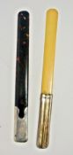 A silver-handled tortoiseshell letter opener and another silver-handled ivory letter opener (2)