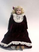 Armand Marseille 370.3/0 bisque-head doll with blue glass fixed eyes, open mouth, soft body with