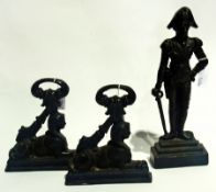 Black painted cast iron doorstop in the form of Napoleon together with a pair of Egyptian-style