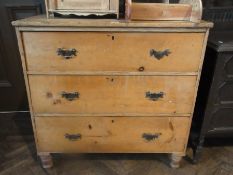 Nineteenth century pine chest of three long graduated drawers on turned feet, width 93cm