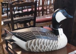 A wooden and painted Canadian goose, 50cm wide approx.