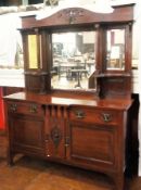 Art Nouveau mahogany mirror-back sideboard, the arched pediment with pierced Art Nouveau scroll