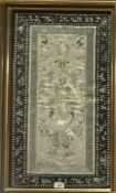 Chinese embroidered panel, cream ground with green border decorated with birds of paradise,