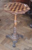 Victorian figured walnut and inlaid games table, the octagonal top inlaid with chequerboard, on