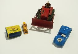 A Dinky Supertoys Blaw Knox bulldozer, Triang plastic racing car and a Matchbox model No 24