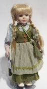 20th century bisque-head doll with fixed glass eyes, moulded mouth, soft body with bisque arms and