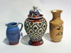 A quantity of studio and other ceramics including porcelain covered vase