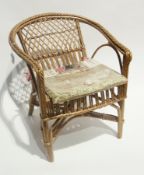 A doll's canework chair