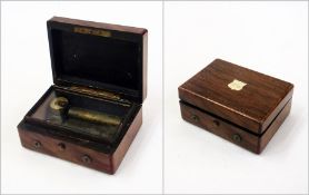 A pocket cylinder musical box, in mahogany case, 11cm wide    Condition Report  Please contact the
