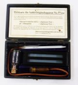 Quantity mid 20th century syringes etc in Arnold and Sons mahogany case, hypodermic needles, blood