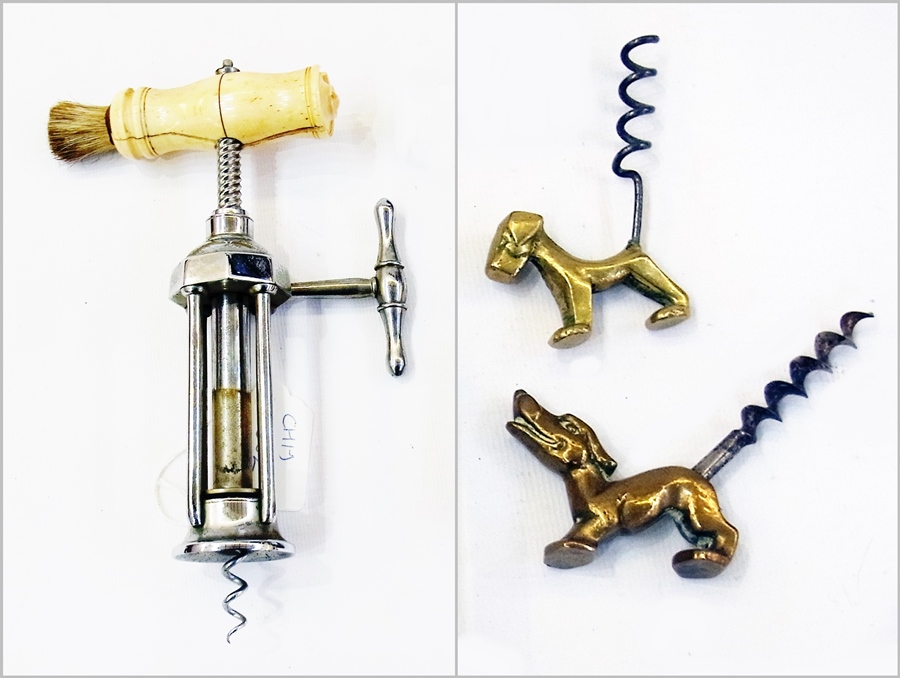 A brass corkscrew in the shape of a dog, another and a bone handled corkscrew (3)   Condition Report