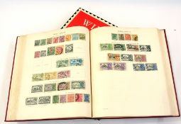 Four stamp albums to include some World stamps in New Ideal album, mainly mint GB in Windsor