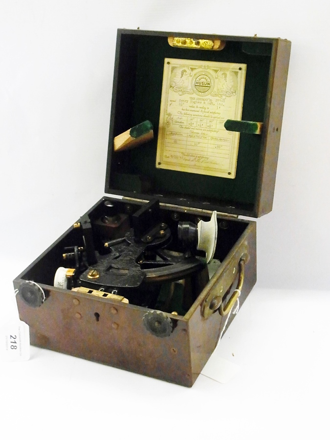 A Henry Hughes & Son Ltd sextant no.37745, dated 08/12/1943, in fitted box with label inside lid and