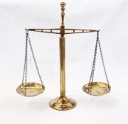 A set of brass Bankers-style balance scales, 48cm high    Live Bidding:  Please contact the