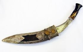 Kukri in sheath with silver coloured metal mounts   Live Bidding:  Please contact the Auctioneer for