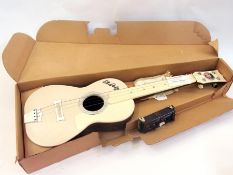 An Elvis Presley toy guitar with guitar accessories, in original box    Condition Report  Please