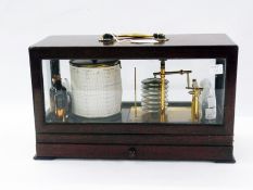 A Gluck & Co barograph in mahogany case, with pull-out drawer and extra chart papers   Condition