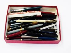 A quantity of fountain pens and biros to include:- Parker 14ct, Sheaffers 14ct, cheroot holder and