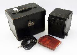 A Houghtons Ltd "Ensign" reflex model B camera in leather carrying case    Condition Report