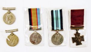 Four WW II medals including:- Australian service medal name to "QF271306.D.T.Christian",