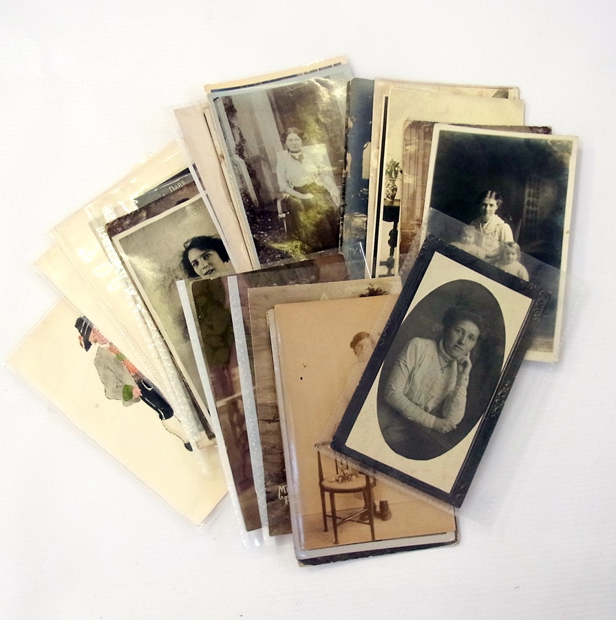 A large quantity of early 20th century postcards to include:- people, portraits, greetings cards,