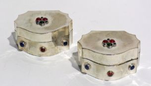 A pair of silver coloured metal cabochon-coloured glass encrusted boxes