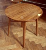 An oak circular occasional table by Kenneth Desmond Lampard, Cotswold School, on straight