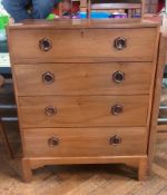 A walnut chest of four drawers by Kenneth Desmond Lampard, Cotswold School, on bracket feet, 60cm