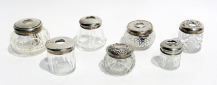 A collection of silver-topped glass hair tidy and toilet jars, various, (7)