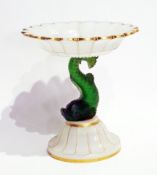 A Victorian opaline and gilt glass dessert comport with scalloped gilt edged top, on dolphin