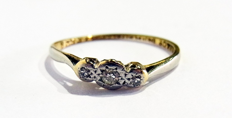 An 18ct gold and diamond three-stone ring