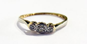 An 18ct gold and diamond three-stone ring