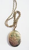 A gold-coloured and enamel oval locket, hinged and the 9ct gold chain link necklace