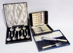 A silver plate soup spoon set, cased, a pair of fish servers, cased and a set of six fish knives and
