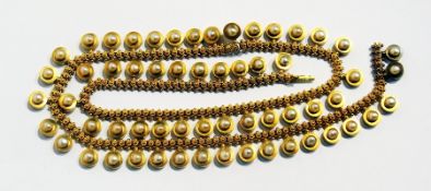 Victorian gold-coloured metal and pearl etruscan-style necklace with pierced ornate chain applied