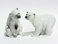 Two Lladro polar bears, one seated